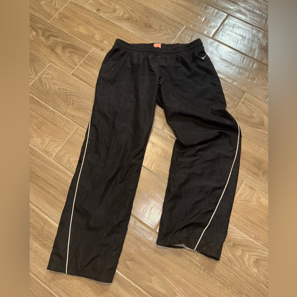 NIKE THE ATHLETIC DEPT. WOMEN'S LINED BLACK TRACKPANTS SIZE L ELASTIC WAIST - Picture 1 of 13